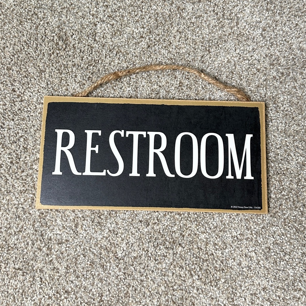 Black and White Restroom Sign